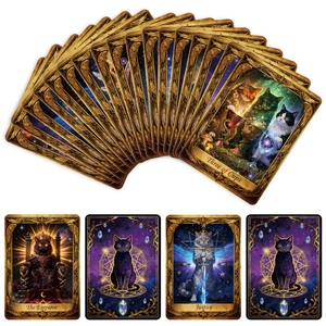 Detail of whimsical cat tarot cards with gold edges and magical hand-drawn art