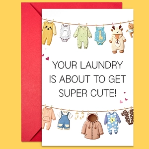 Carte de vœux avec vêtements de bébé sur une corde et enveloppe rouge vive