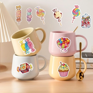 Waterproof cartoon candy stickers applied on pastel ceramic mugs for decoration