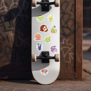 Waterproof summer dessert stickers shown on a white skateboard with graffiti street backdrop