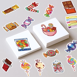 Flat lay macro of colorful waterproof candy stickers with white die-cut borders