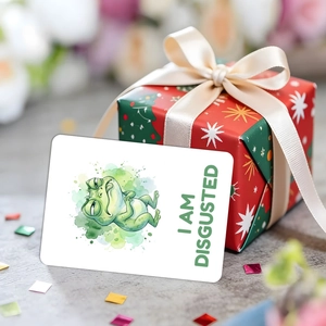 Macro shot of a watercolor frog emotion card with I AM DISGUSTED text and a red gift box