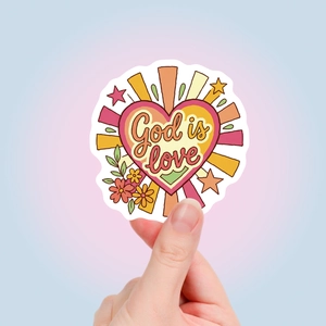 Detail of a God is Love heart sticker with colorful sunburst and floral retro design