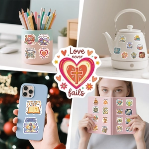 Detailed view of Bible-inspired stickers with crosses and hearts on everyday objects