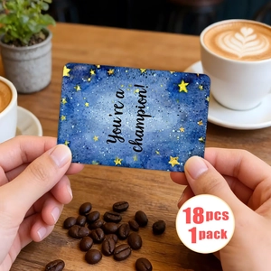 Close-up of You're a champion! starry motivational card held over a cozy coffee table