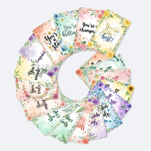 Macro view of 18 watercolor floral encouragement cards with inspirational quotes