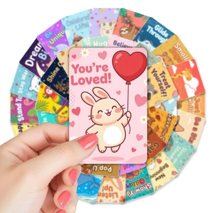 Close-up of cute animal lunch box notes with inspirational quotes for kids