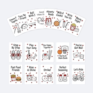 Close-up showing various cartoon motivational cards with playful puns and cute illustrations