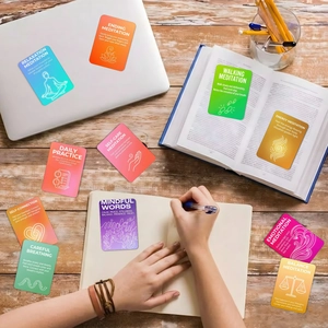 Mindfulness meditation cards for relaxation and mental wellness set on a wooden desk