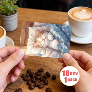 Detail of hand holding a cute watercolor cat illustration card from an 18-piece set