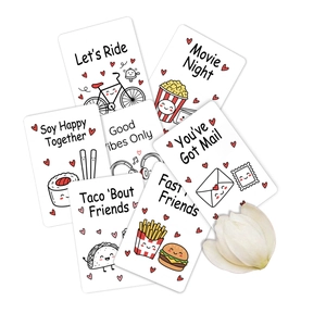 Close-up of cute cartoon greeting cards with sweet puns and warm motivational phrases