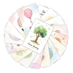 Macro shot of colorful watercolor milestone cards with rounded edges and soft patterns