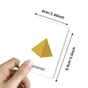 Educational 3D geometric shape learning card with a yellow pyramid for toddlers