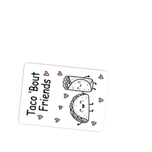 Close-up of cute Taco 'Bout Friends cartoon card with heart illustrations on white base