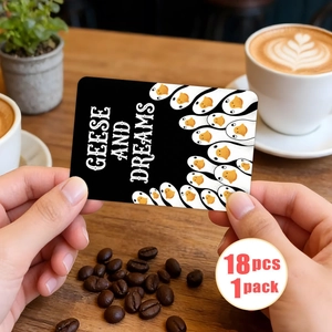 Détail de 18 cartes éducatives Geese and Dreams présentées dans un cadre de café chaleureux