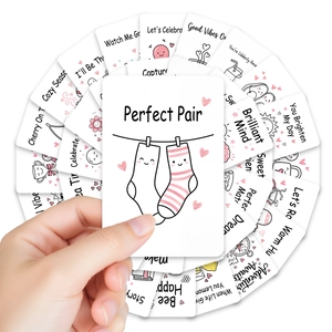 Close-up of colorful lunch box notes with motivational quotes and cute illustrations