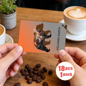 Detailed close-up of volcanic earth bear card held in hands over a warm cafe background