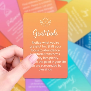 Macro shot of Gratitude affirmation card with orange gradient and rounded edges