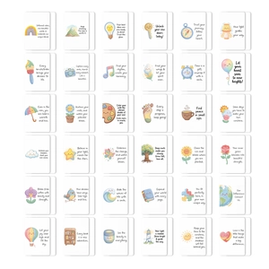 Flat lay of 36 affirmation cards featuring cute hand-drawn illustrations and quotes