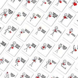 Close-up of minimalist thank you cards with stick figures and red hearts on white paper