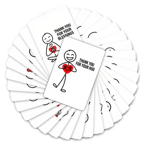 Macro detail of hand-drawn stickman thank you cards with red heart patterns and blessings