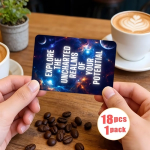 Close-up of starry night theme card with motivational quote held in hands