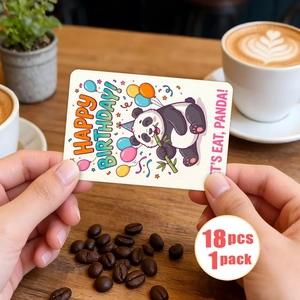Close-up of 18pcs panda and balloon birthday cards set on a cozy coffee table
