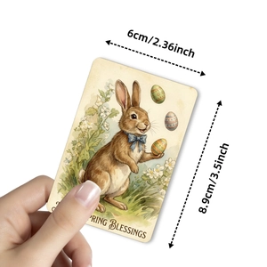 Close-up of vintage Easter bunny card with 6x8.9cm dimensions held in hand