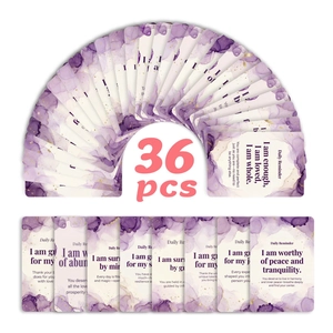 Macro detail of 36 purple marble affirmation cards with gold star and daily reminders