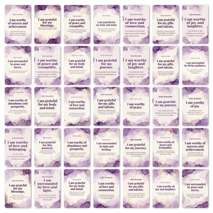 Flat lay of 35 daily affirmation cards with purple marble texture and gold accents