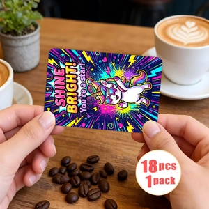 Retro Pop Art card with unicorn and motivational text shown in a cozy cafe setting