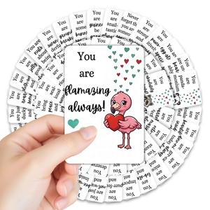 Close-up of inspirational cards with cute animal illustrations and pun quotes on white cardstock