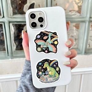 Detail of white iPhone case with cute space dinosaur illustrations on glass brick background