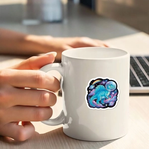 Close-up of waterproof cartoon astronaut dinosaur sticker on a white ceramic mug