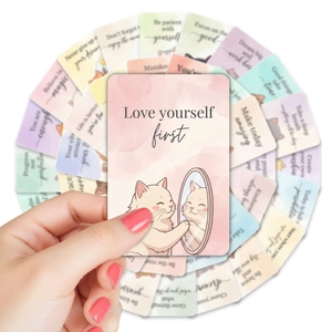 Detail of watercolor cat affirmation cards featuring inspirational English quotes and art
