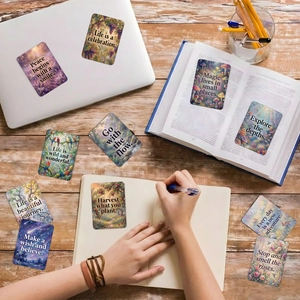 Set of Monet style nature landscape inspirational quote cards on a wooden desk