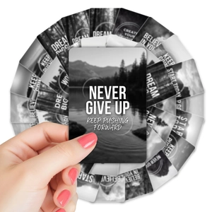 Close-up of inspirational cards featuring black landscape photos and white bold typography