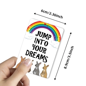 Cartoon kangaroo motivational card with rainbow and Jump Into Your Dreams quote
