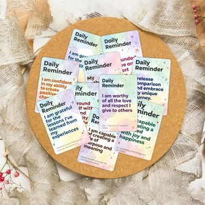 Detailed view of daily reminder affirmation cards on cork with cozy aesthetic decor