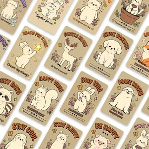 Close-up of decorative cards featuring hand-drawn animals and inspirational quotes