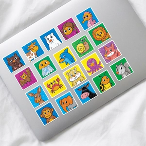 Colorful crayon animal stickers in a 4x5 grid applied on a laptop shell decoration
