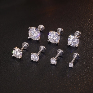 Detailed view of S925 sterling silver stamp and 4-prong moissanite stud earring set