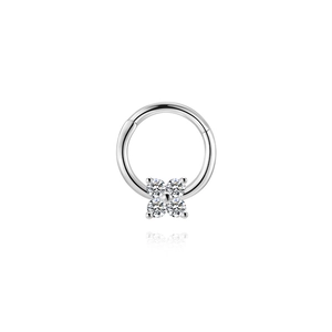 Macro detail of S925 silver hinged hoop ring featuring a four-petal zirconia flower design