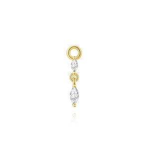 Macro detail of gold earrings charm featuring two marquise-cut gems in a vertical setting