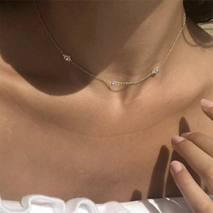 Elegant S925 sterling silver clavicle necklace with three sparkling bezel-set cubic zirconias