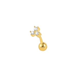 Detailed view of a gold curved barbell piercing with three claw-set white zircons