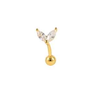 Close-up of golden curved barbell piercing featuring marquise-cut zircons in a V-shape