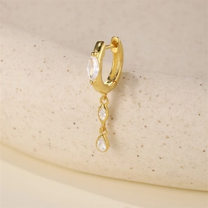 Detail of S925 sterling silver earring with marquise zircon and engraved hallmark