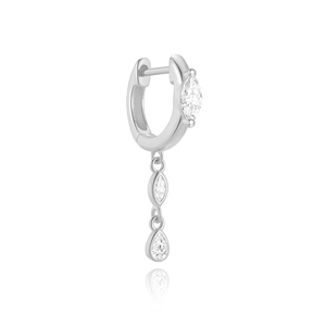 Detail of silver S925 huggie earring with marquise and pear shaped cubic zirconia drops