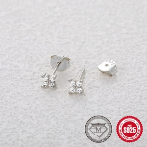 Detail of S925 sterling silver stamp on four-petal moissanite flower stud earrings